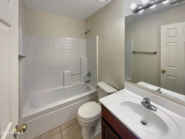 full bathroom featuring oversized vanity, tile floors, toilet, and bathtub / shower combination