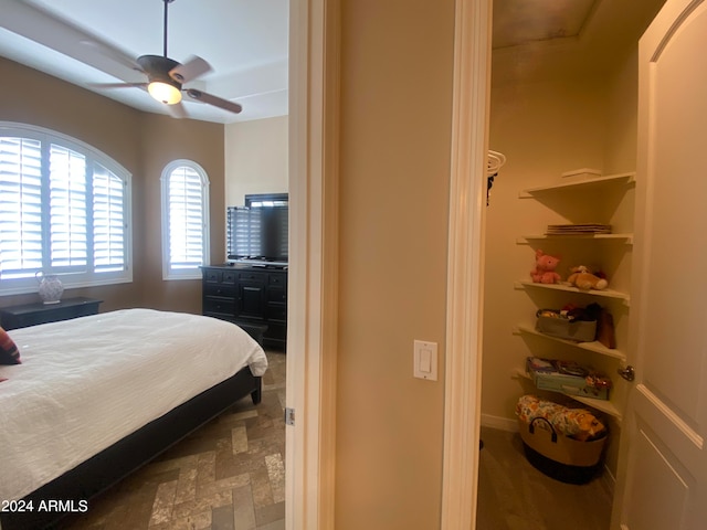 bedroom featuring ceiling fan