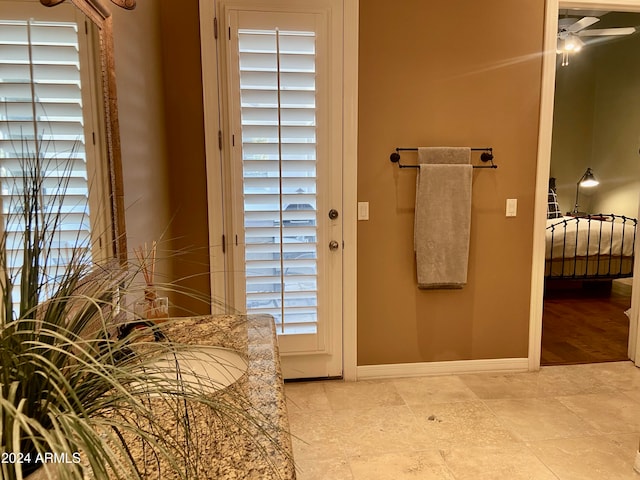 doorway with hardwood / wood-style flooring