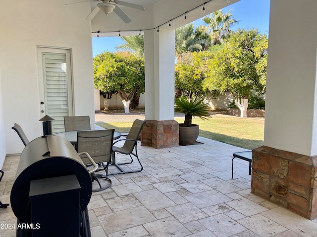 view of patio featuring ceiling fan