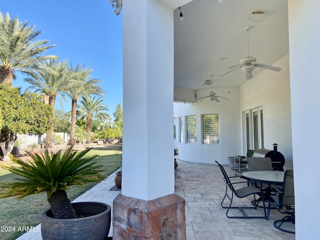 view of patio / terrace featuring ceiling fan