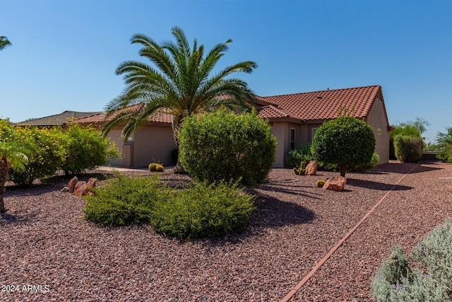 15631 W Bethesda Ct, Surprise, AZ 85374 - view of front of house featuring stucco siding and a tile roof