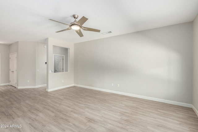 unfurnished room featuring light wood-type flooring and ceiling fan