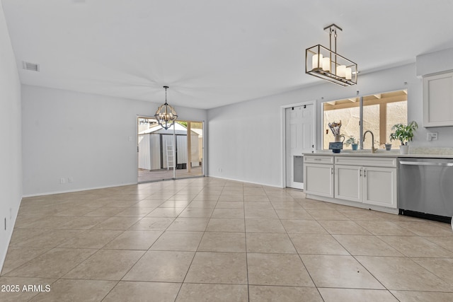 2313 N 87th Way, Scottsdale, AZ 85257 - kitchen featuring dishwasher, a chandelier, a sink, light countertops, and pendant lighting