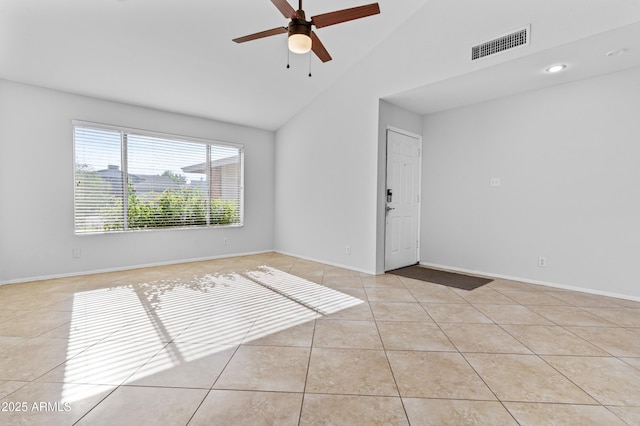 2313 N 87th Way, Scottsdale, AZ 85257 - spare room with tile patterned floors, high vaulted ceiling, ceiling fan, and baseboards