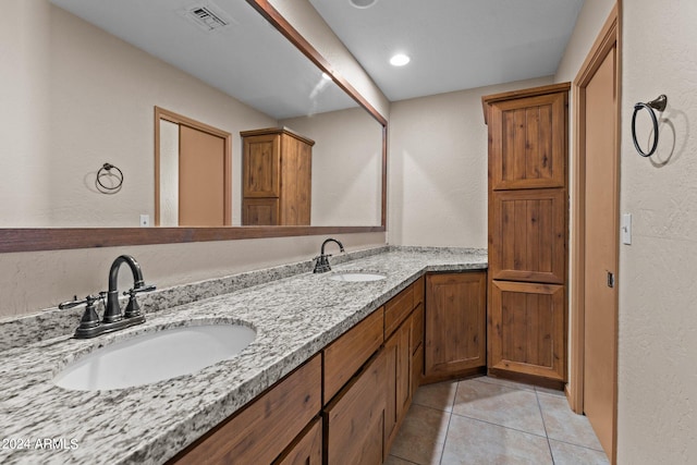 bathroom featuring vanity and tile patterned floors