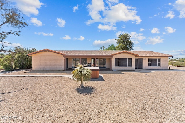 ranch-style house featuring a patio area