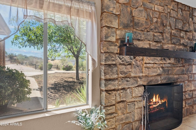 room details featuring tile patterned flooring and a fireplace