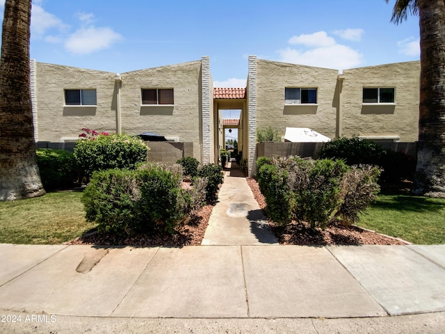 view of front of home with a front yard