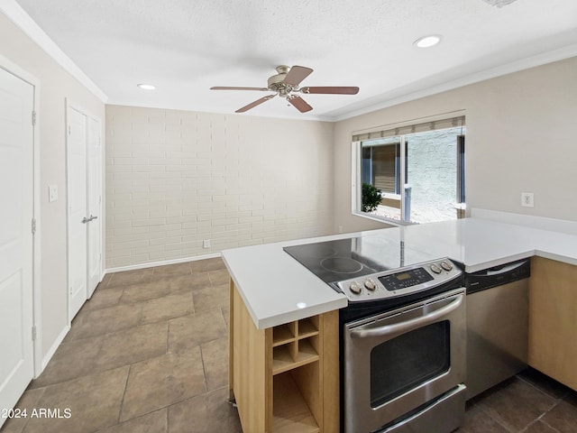 kitchen with kitchen peninsula, a textured ceiling, and stainless steel appliances