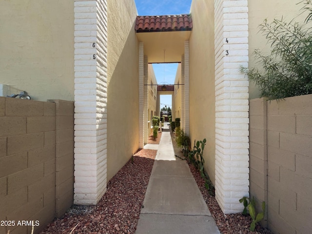 4925 N 73rd St Unit 4, Scottsdale, AZ 85251 - view of side of home featuring a tiled roof and stucco siding