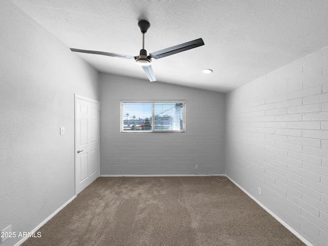 4925 N 73rd St Unit 4, Scottsdale, AZ 85251 - empty room with carpet, a textured ceiling, baseboards, a ceiling fan, and lofted ceiling