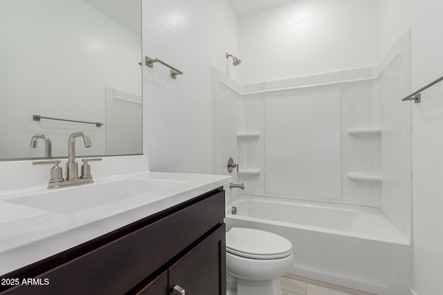 full bathroom featuring bathing tub / shower combination, vanity, and toilet