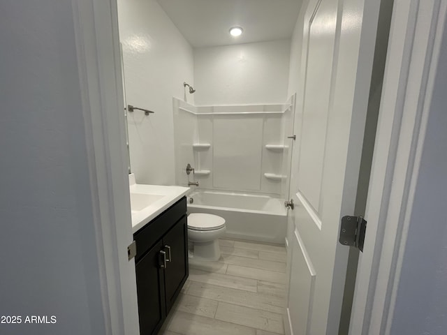 full bath featuring toilet, shower / tub combination, and vanity