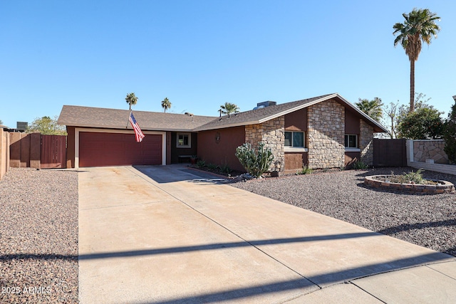 ranch-style house featuring a garage