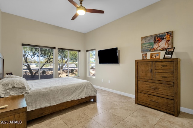 tiled bedroom with ceiling fan