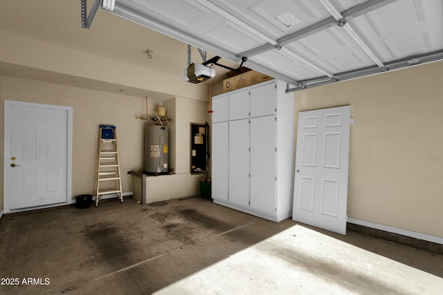 garage featuring a garage door opener and electric water heater