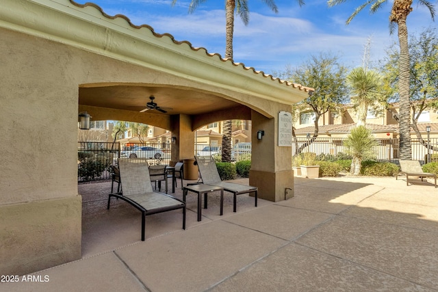 view of patio featuring ceiling fan