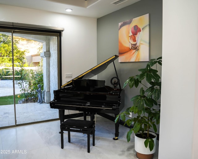 sitting room featuring visible vents