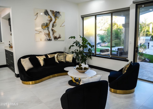 living room featuring a wealth of natural light