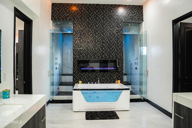 bathroom with vanity and a shower stall