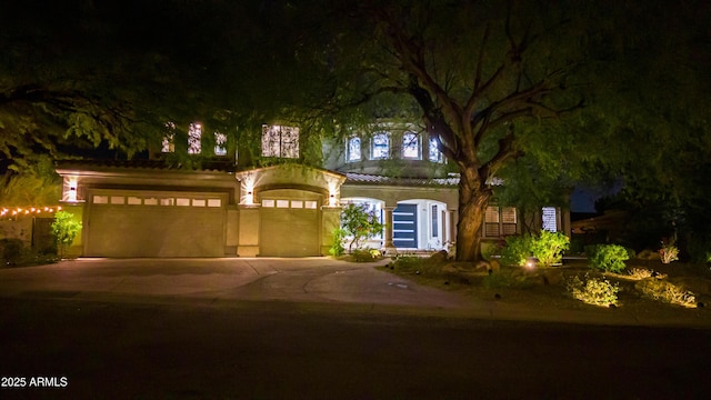 view of front of house featuring a garage and driveway