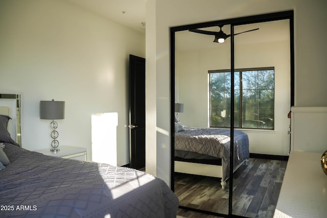 bedroom with dark wood finished floors