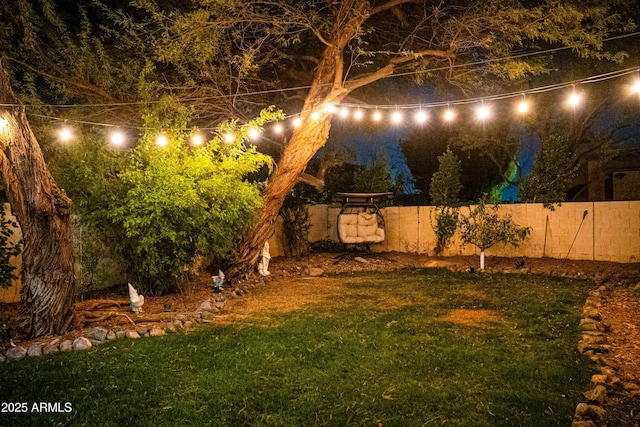 yard at twilight with fence