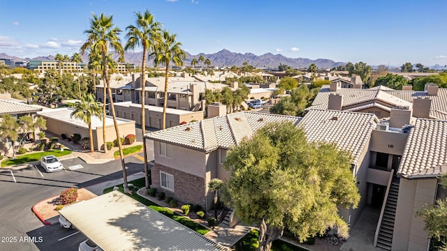 bird's eye view featuring a residential view and a mountain view