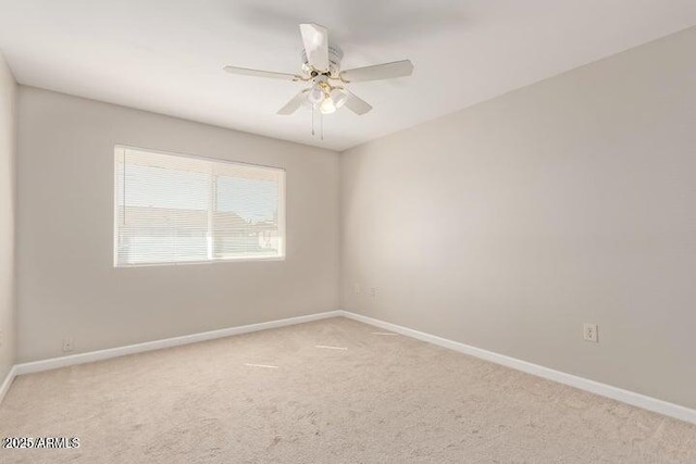 10448 W Caron Dr, Sun City, AZ 85351 - carpeted empty room with baseboards and a ceiling fan