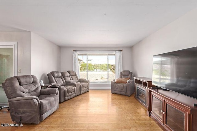10448 W Caron Dr, Sun City, AZ 85351 - living area with light wood-type flooring