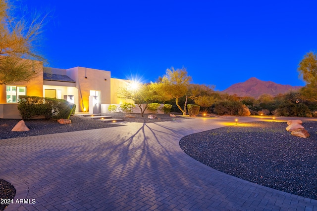 exterior space featuring a mountain view