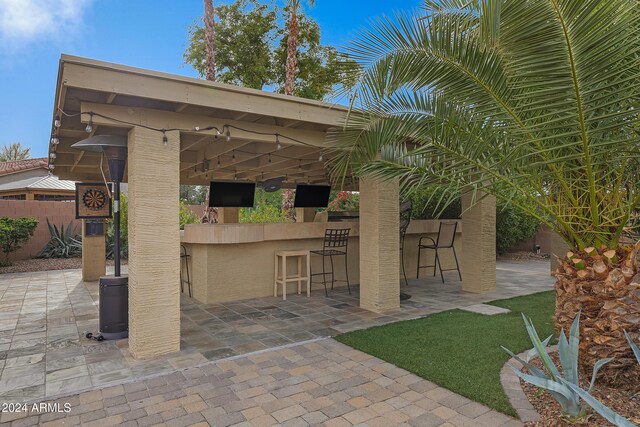 view of patio / terrace with a bar