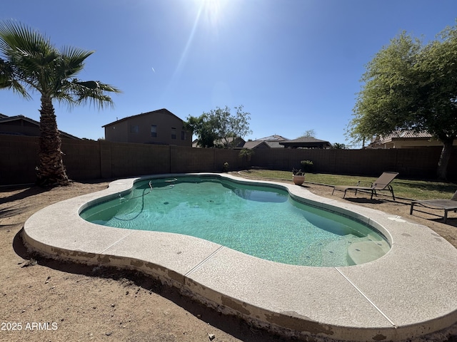 view of pool featuring a fenced backyard, a fenced in pool, and a patio