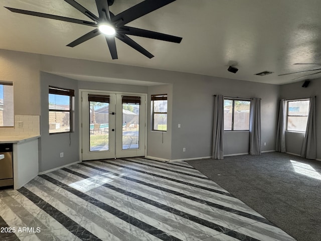 interior space featuring visible vents, baseboards, a ceiling fan, french doors, and access to outside
