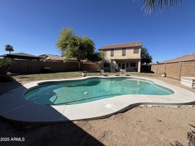 view of pool with a fenced in pool, a patio, and a fenced backyard