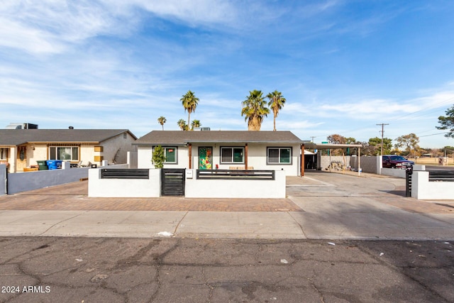 single story home with a carport