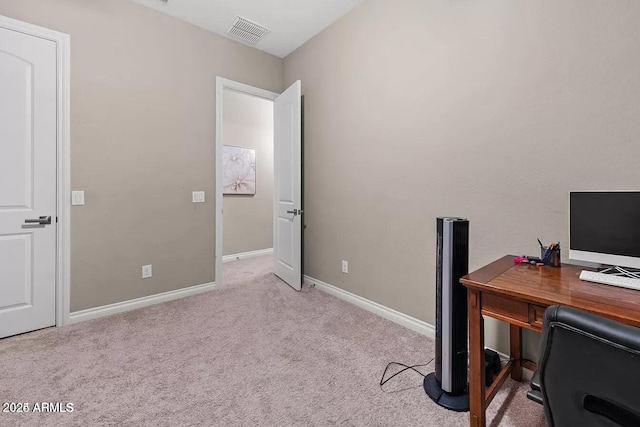 home office featuring light colored carpet