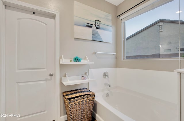 bathroom with a tub