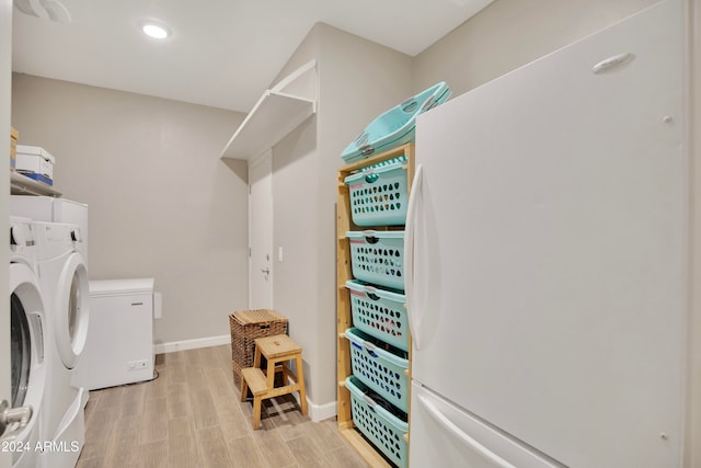 laundry area with separate washer and dryer