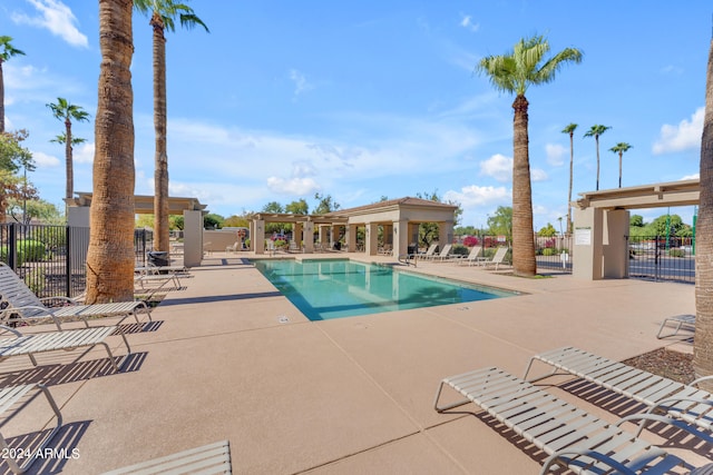 view of swimming pool featuring a patio