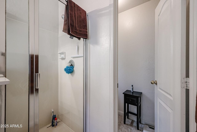 bathroom featuring a stall shower