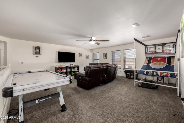 rec room featuring carpet floors and ceiling fan