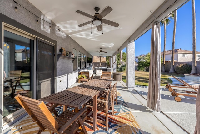 sunroom / solarium with ceiling fan