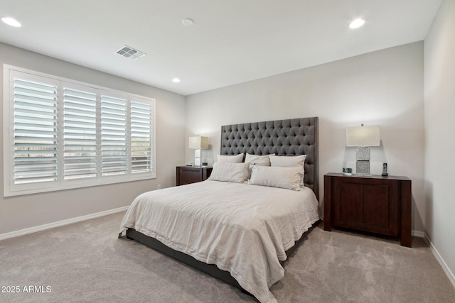 carpeted bedroom featuring recessed lighting, baseboards, and visible vents