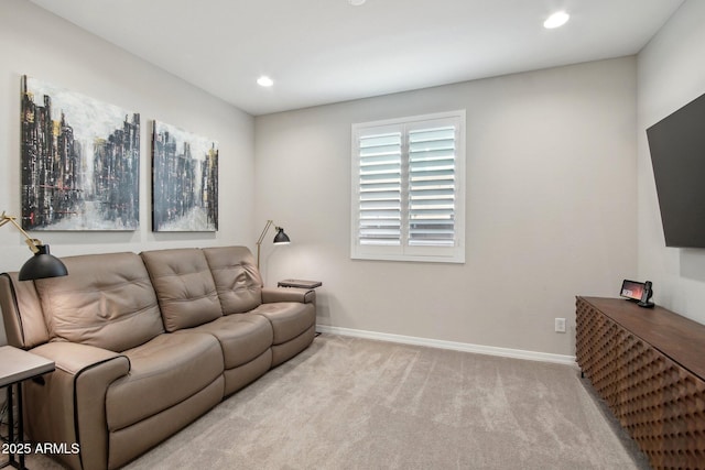 living room with recessed lighting, carpet, and baseboards