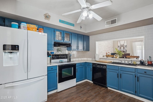 kitchen with white fridge with ice dispenser, blue cabinetry, under cabinet range hood, electric stove, and dishwasher