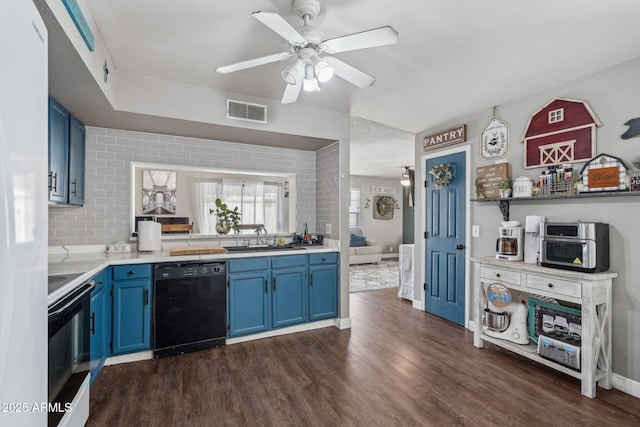 kitchen with blue cabinetry, visible vents, dishwasher, a sink, and electric range oven