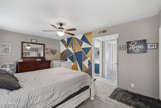 bedroom with carpet floors, ceiling fan, and visible vents