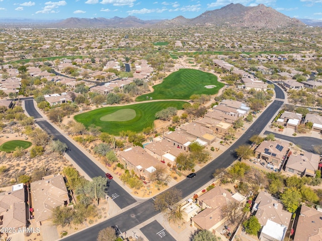 bird's eye view with a mountain view, view of golf course, and a residential view